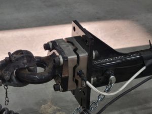 A load cell measuring forces in a pintle hitch application