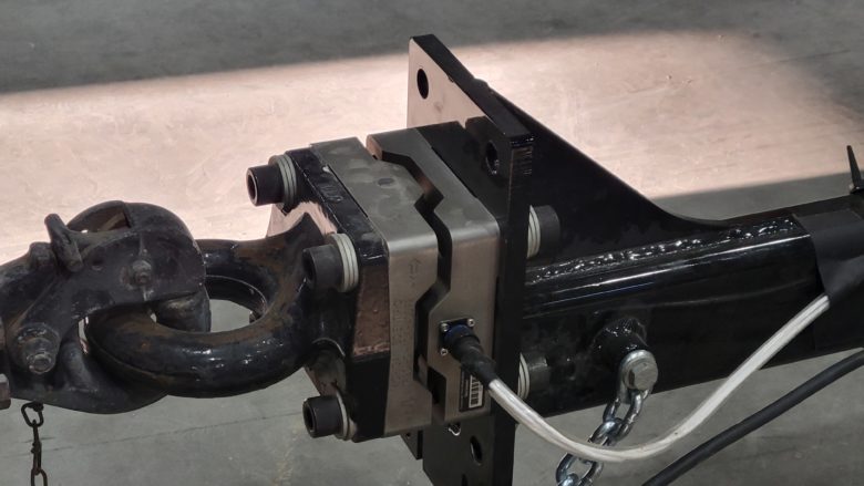 A load cell measuring forces in a pintle hitch application